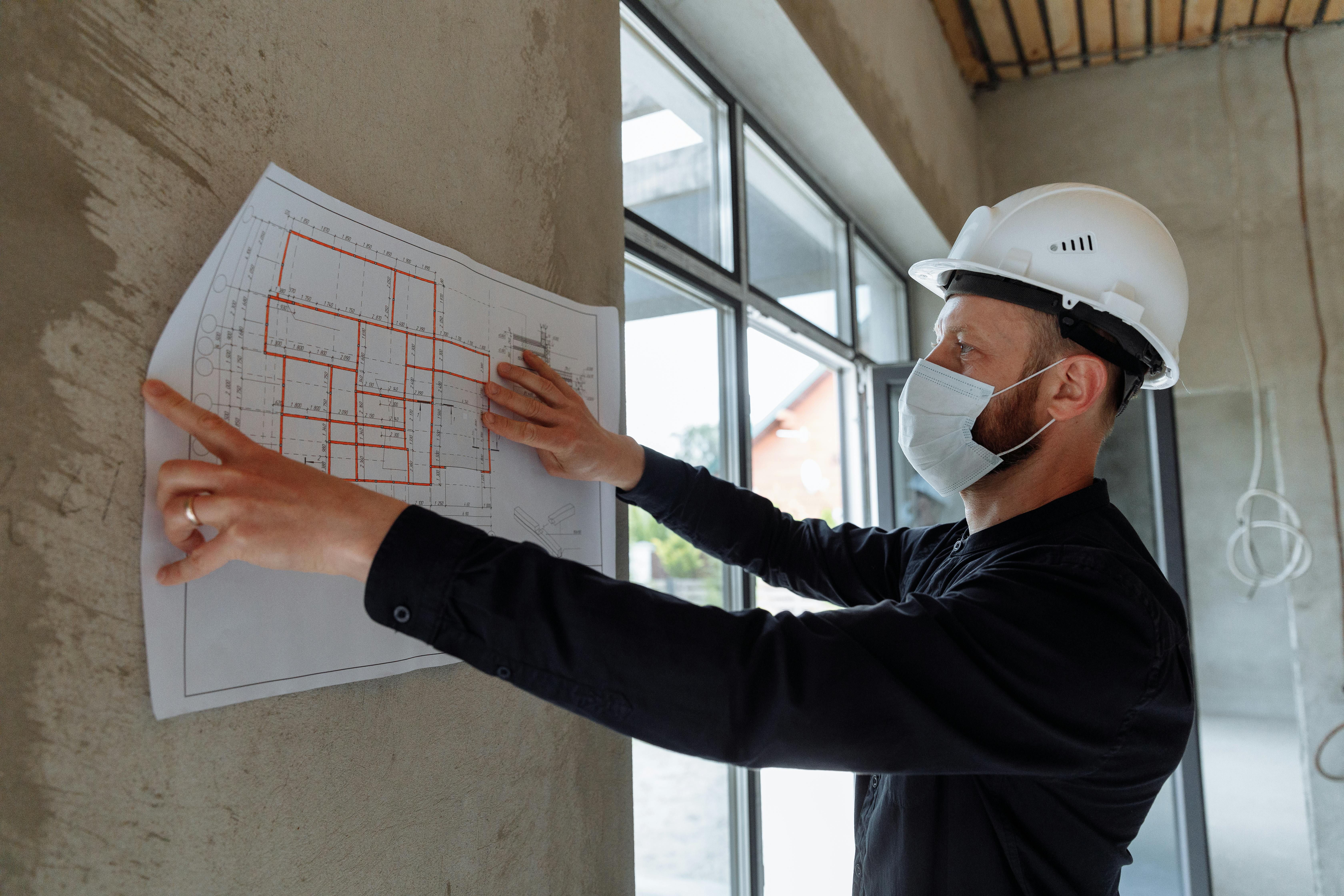 Compliance checklist with a hard hat and clipboard