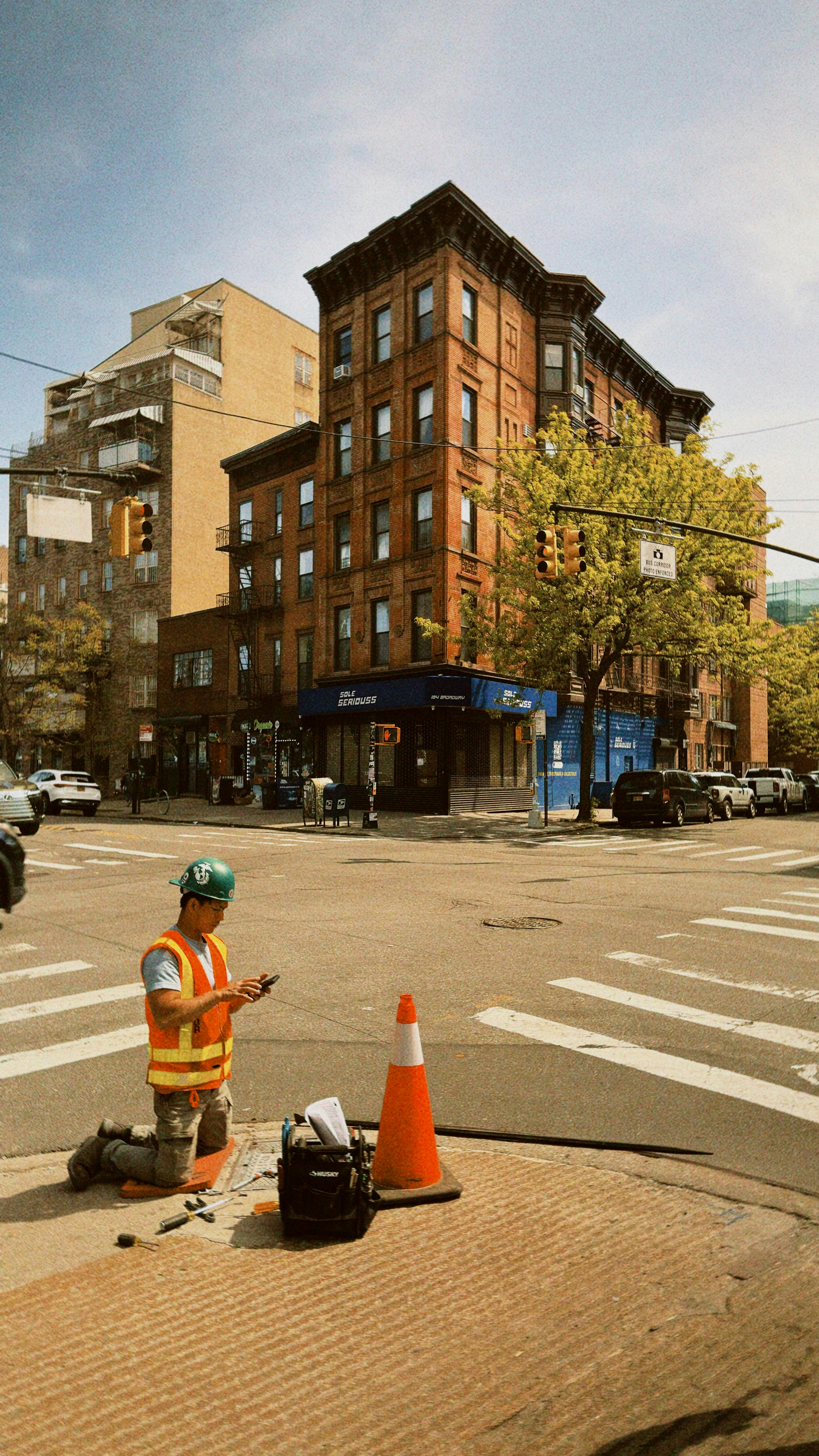 Contractor checking subcontractor compliance status on a smartphone